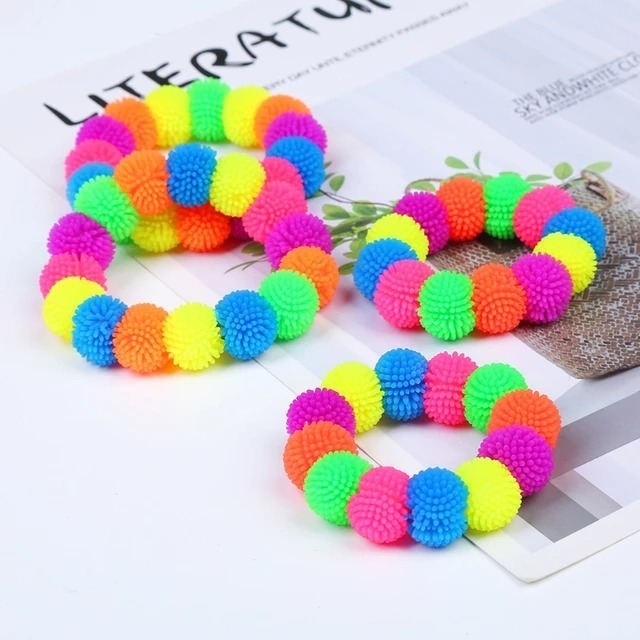 Pulsera Infantil Arcoiris Amansaloco Apretable Sorpresita - Imagen 2